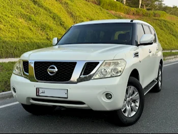 Nissan  Patrol  SE  2012  Automatic  125,000 Km  8 Cylinder  Four Wheel Drive (4WD)  SUV  White