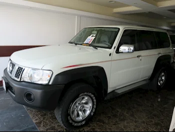 Nissan  Patrol  GL  2021  Manual  58,000 Km  6 Cylinder  Four Wheel Drive (4WD)  SUV  White