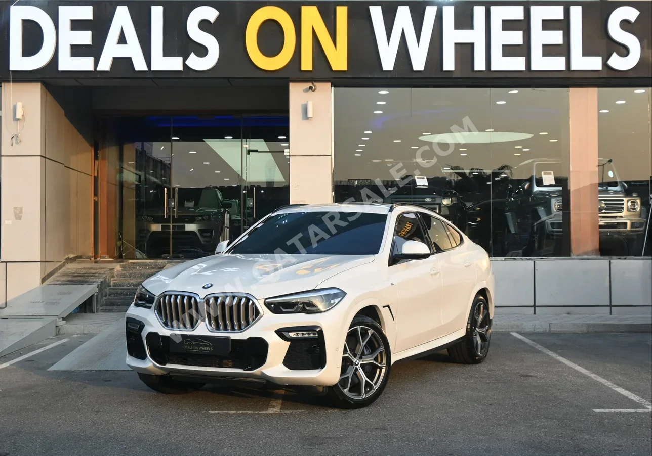  BMW  X-Series  X6 40i  2021  Automatic  83,700 Km  6 Cylinder  All Wheel Drive (AWD)  SUV  White  With Warranty