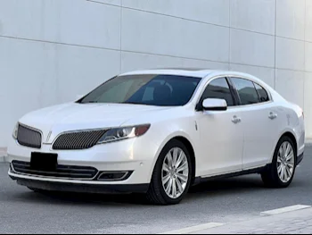 Lincoln  MKS  2016  Automatic  55٬000 Km  6 Cylinder  All Wheel Drive (AWD)  Sedan  White
