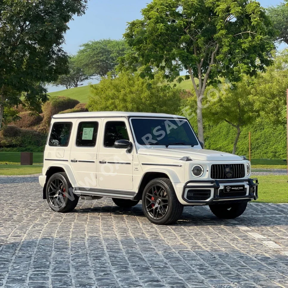 Mercedes-Benz  G-Class  63 AMG  2022  Automatic  49,300 Km  8 Cylinder  Four Wheel Drive (4WD)  SUV  White  With Warranty