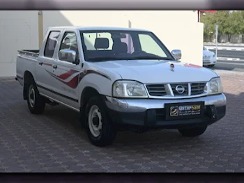 Nissan  Pickup  2007  Manual  107,000 Km  4 Cylinder  Rear Wheel Drive (RWD)  Pick Up  White