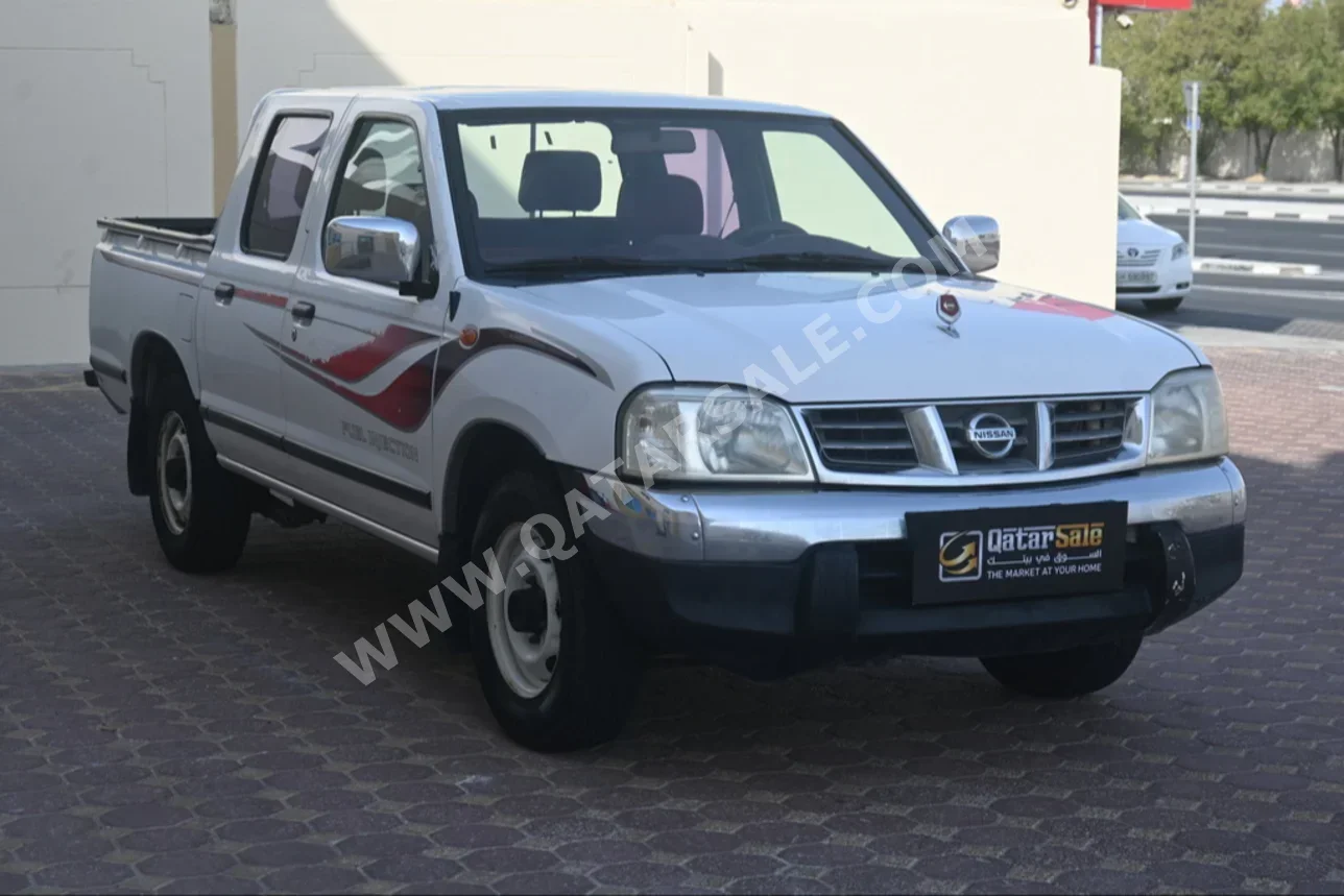 Nissan  Pickup  2007  Manual  107,000 Km  4 Cylinder  Rear Wheel Drive (RWD)  Pick Up  White