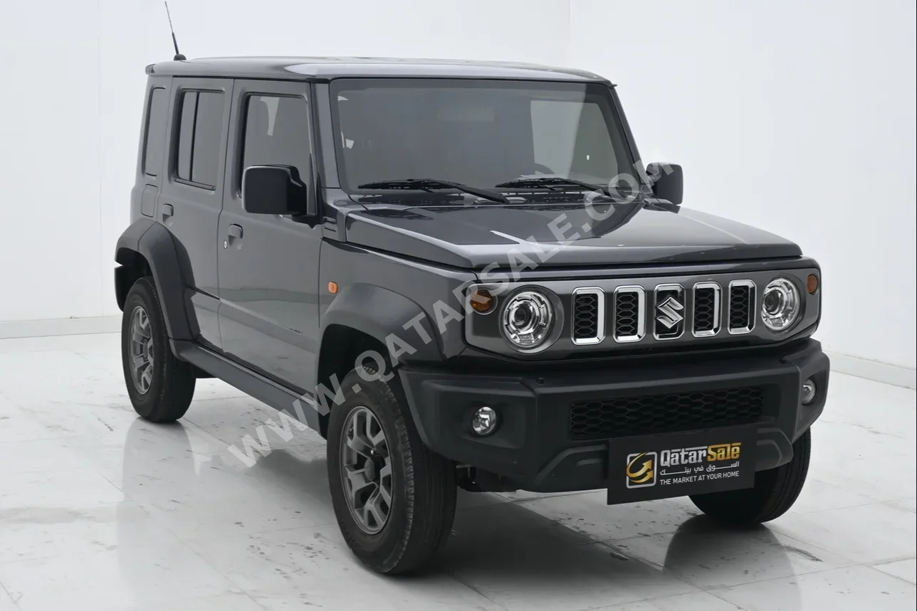 Suzuki  Jimny  2024  Automatic  13,339 Km  4 Cylinder  Four Wheel Drive (4WD)  SUV  Gray  With Warranty