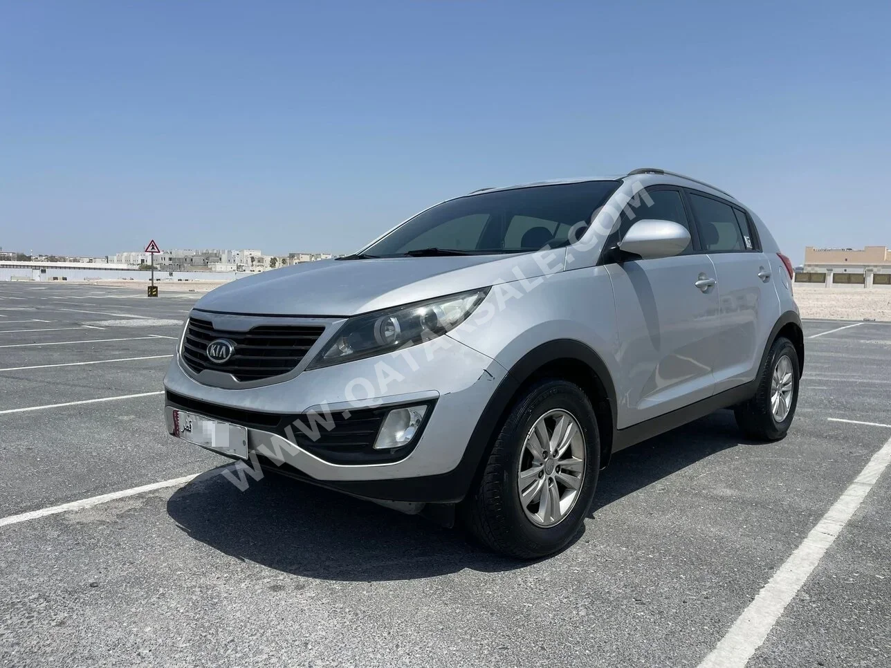 Kia  Sportage  2.0 EX  2012  Automatic  219,000 Km  4 Cylinder  Rear Wheel Drive (RWD)  SUV  Silver  With Warranty