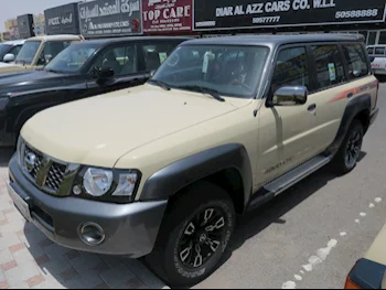 Nissan  Patrol  Super Safari  2023  Automatic  2,000 Km  6 Cylinder  Four Wheel Drive (4WD)  SUV  Beige  With Warranty