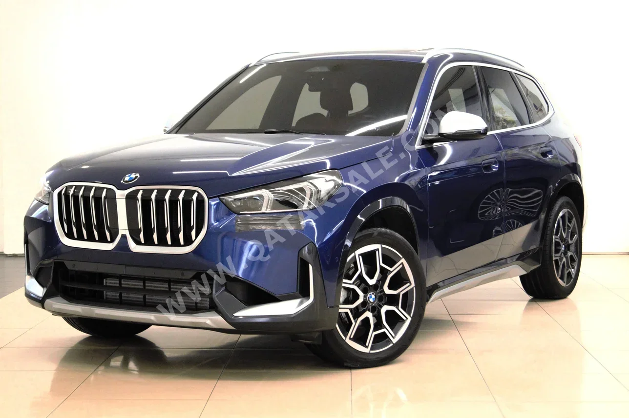 BMW  X-Series  X1  2023  Automatic  30٬000 Km  4 Cylinder  Four Wheel Drive (4WD)  SUV  Blue  With Warranty