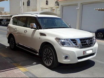  Nissan  Patrol  Platinum  2014  Automatic  224,000 Km  8 Cylinder  Four Wheel Drive (4WD)  SUV  White  With Warranty