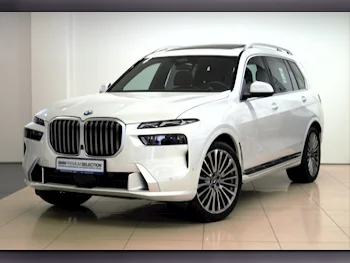 BMW  X-Series  X7 40i  2023  Automatic  13٬950 Km  6 Cylinder  Four Wheel Drive (4WD)  SUV  White  With Warranty