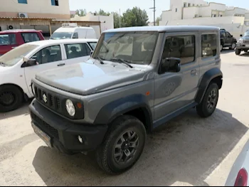 Suzuki  Jimny  2022  Automatic  27,000 Km  4 Cylinder  Four Wheel Drive (4WD)  SUV  Gray