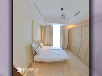 2 Bedrooms  Apartment  For Rent  in Doha -  The Pearl  Fully Furnished