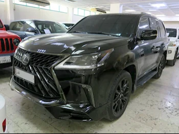 Lexus  LX  570  2020  Automatic  12,000 Km  8 Cylinder  Four Wheel Drive (4WD)  SUV  Black  With Warranty