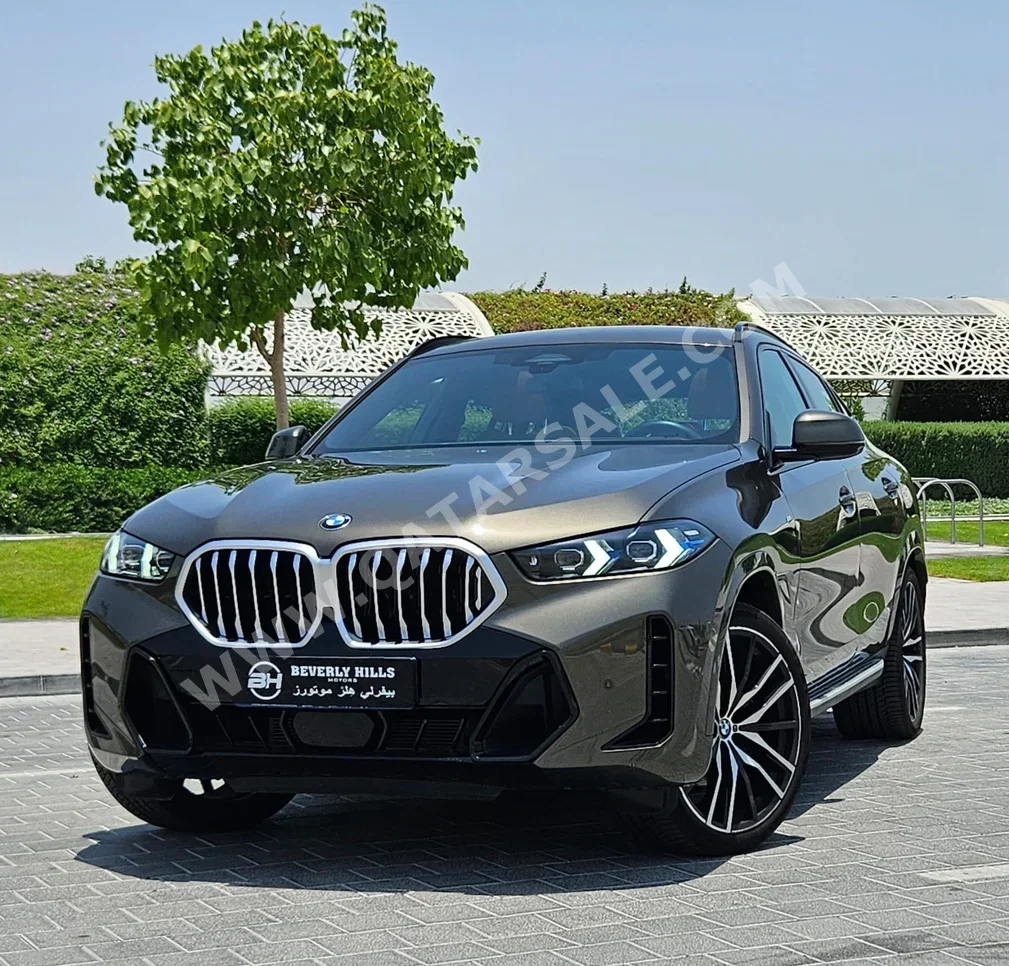 BMW  X-Series  X6 M40i  2024  Automatic  14,950 Km  6 Cylinder  Four Wheel Drive (4WD)  SUV  Green  With Warranty