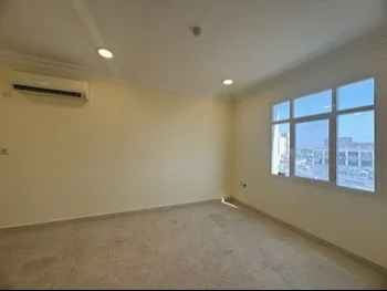 2 Bedrooms  Apartment  For Rent  in Umm Salal -  Umm Salal Ali  Semi Furnished
