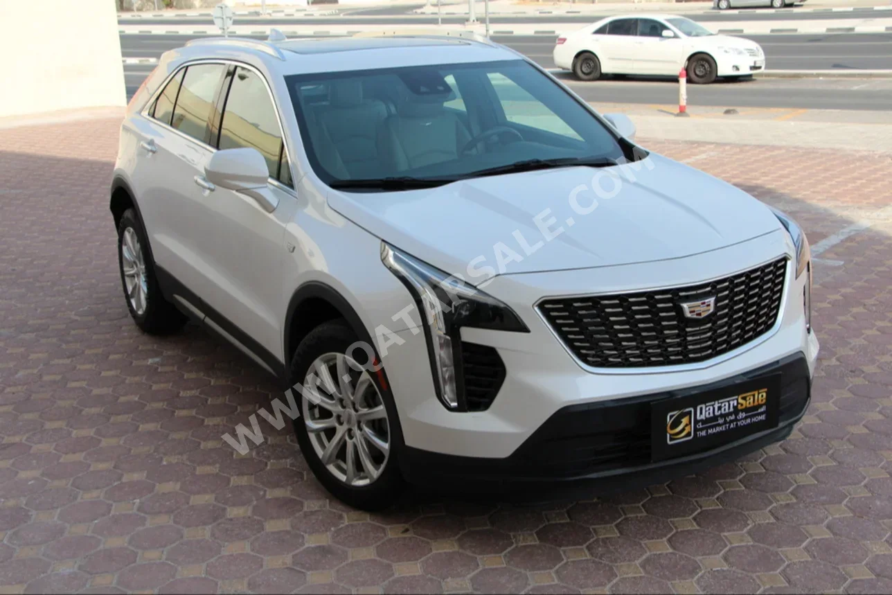 Cadillac  XT4  PREMIUM LUXURY  2020  Automatic  34,000 Km  4 Cylinder  All Wheel Drive (AWD)  SUV  White  With Warranty