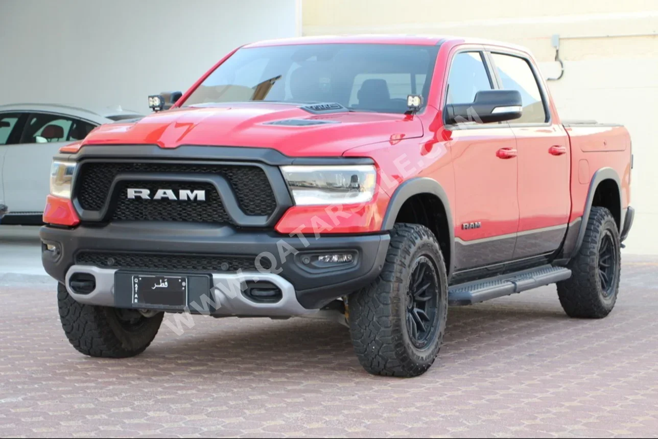  Dodge  Ram  Rebel  2021  Automatic  61,000 Km  8 Cylinder  Four Wheel Drive (4WD)  Pick Up  Red  With Warranty