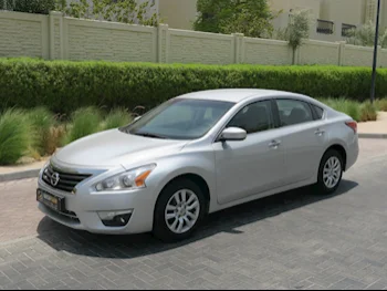 Nissan  Altima  2015  Automatic  125,000 Km  4 Cylinder  Front Wheel Drive (FWD)  Sedan  Silver