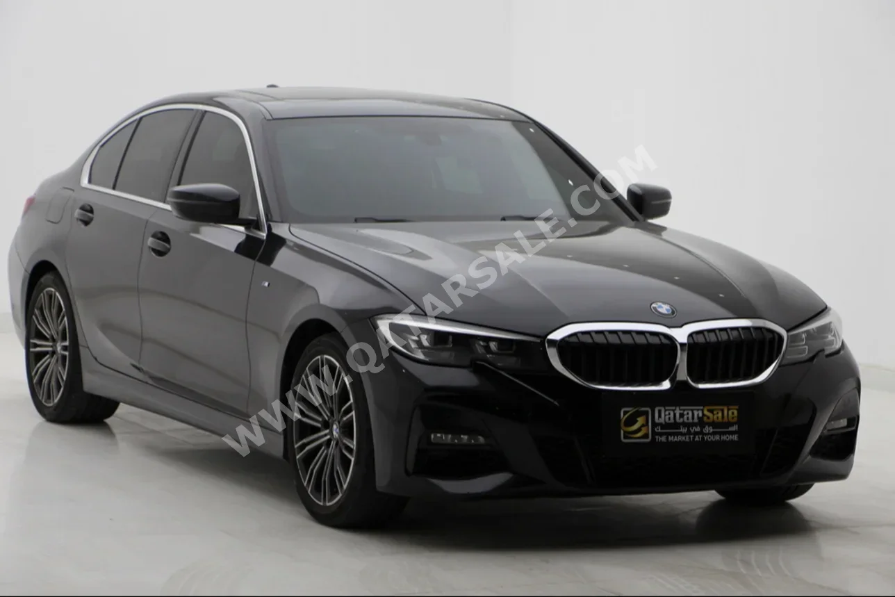 BMW  3-Series  320i  2022  Automatic  62,000 Km  4 Cylinder  Rear Wheel Drive (RWD)  Sedan  Black  With Warranty