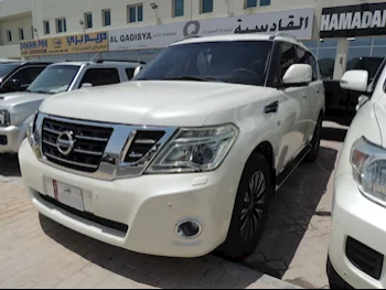 Nissan  Patrol  Platinum  2014  Automatic  271,000 Km  8 Cylinder  Four Wheel Drive (4WD)  SUV  White