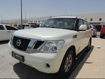 Nissan  Patrol  2012  Manual  274٬000 Km  8 Cylinder  Four Wheel Drive (4WD)  SUV  White