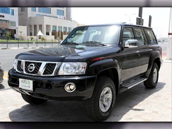 Nissan  Patrol  Safari  2024  Manual  0 Km  6 Cylinder  Four Wheel Drive (4WD)  SUV  Black  With Warranty