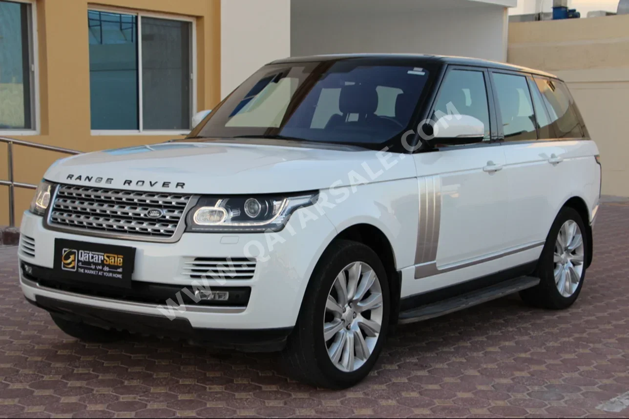  Land Rover  Range Rover  Vogue  2016  Automatic  254,000 Km  8 Cylinder  Four Wheel Drive (4WD)  SUV  White  With Warranty