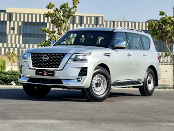 Nissan  Patrol  Platinum  2013  Automatic  400٬000 Km  8 Cylinder  Four Wheel Drive (4WD)  SUV  Silver