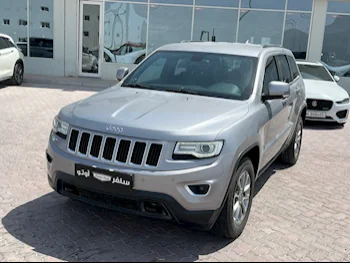 Jeep  Grand Cherokee  Laredo  2015  Automatic  84,000 Km  6 Cylinder  Four Wheel Drive (4WD)  SUV  Silver