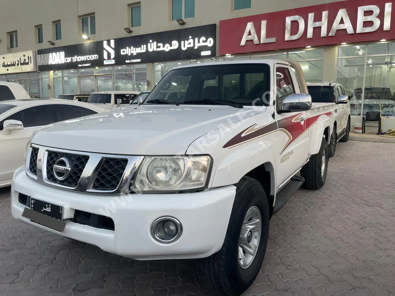 Nissan  Patrol  Pickup  2014  Manual  132,000 Km  6 Cylinder  Four Wheel Drive (4WD)  Pick Up  White