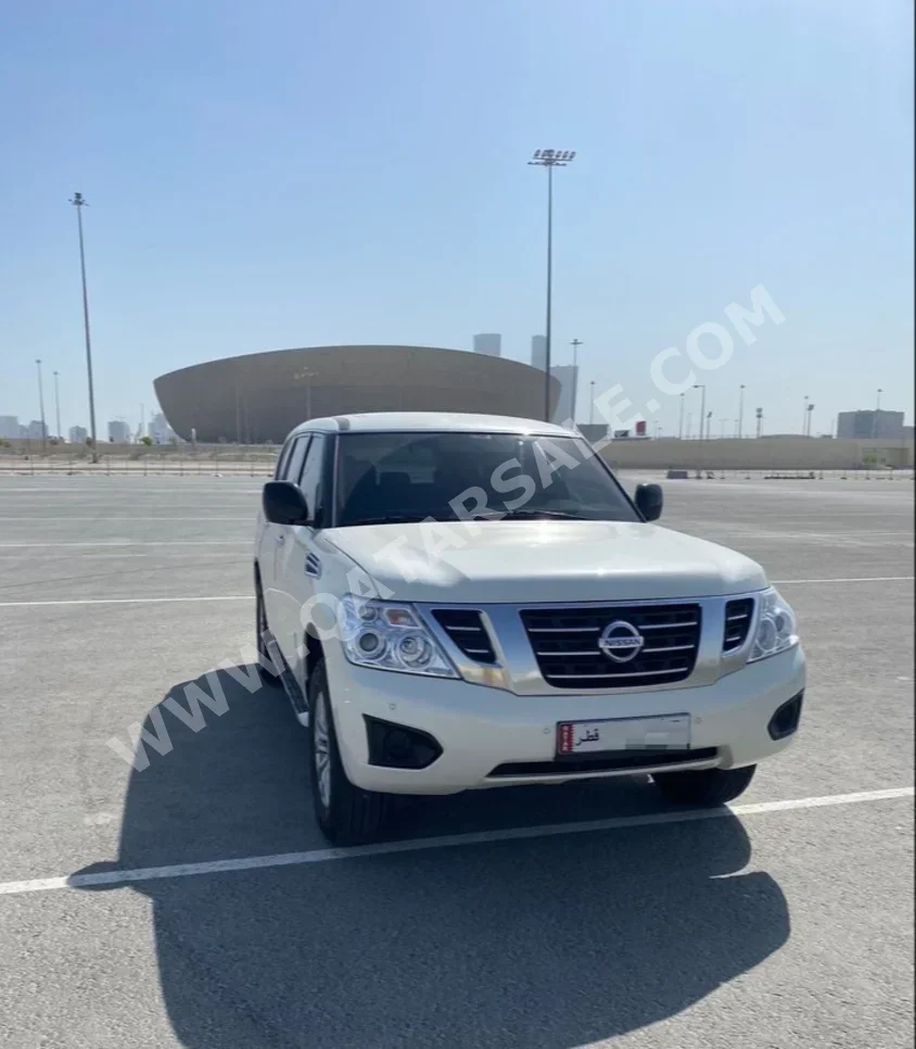 Nissan  Patrol  XE  2019  Automatic  87,000 Km  6 Cylinder  Four Wheel Drive (4WD)  SUV  White