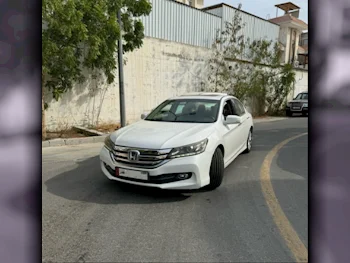 Honda  Accord  EXL  2015  Automatic  65,000 Km  4 Cylinder  Front Wheel Drive (FWD)  Sedan  White