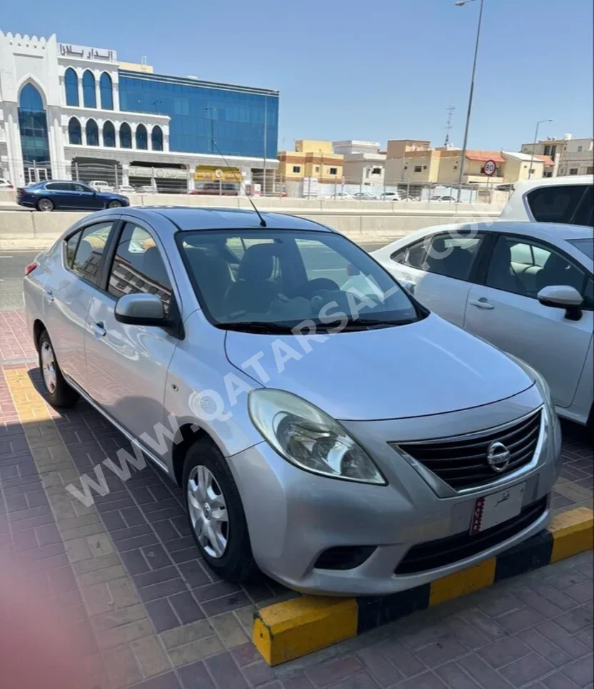 Nissan  Sunny  2012  Automatic  234,500 Km  4 Cylinder  Front Wheel Drive (FWD)  Sedan  Silver