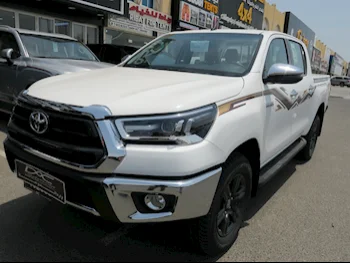 Toyota  Hilux  2024  Automatic  0 Km  4 Cylinder  Four Wheel Drive (4WD)  Pick Up  White  With Warranty