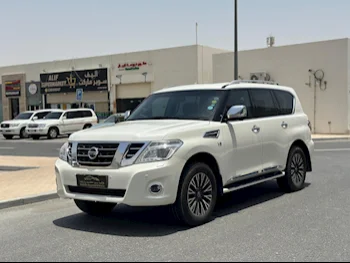 Nissan  Patrol  Platinum  2015  Automatic  257,000 Km  8 Cylinder  Four Wheel Drive (4WD)  SUV  White