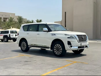 Nissan  Patrol  SE  2012  Automatic  245,000 Km  8 Cylinder  Four Wheel Drive (4WD)  SUV  White