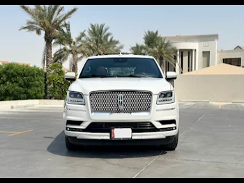 Lincoln  Navigator  2021  Automatic  93,000 Km  6 Cylinder  Four Wheel Drive (4WD)  SUV  White  With Warranty