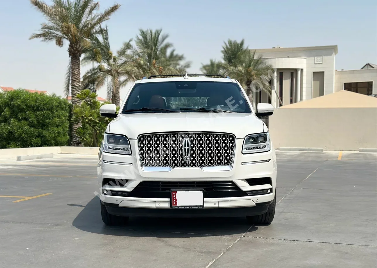 Lincoln  Navigator  2021  Automatic  93,000 Km  6 Cylinder  Four Wheel Drive (4WD)  SUV  White  With Warranty