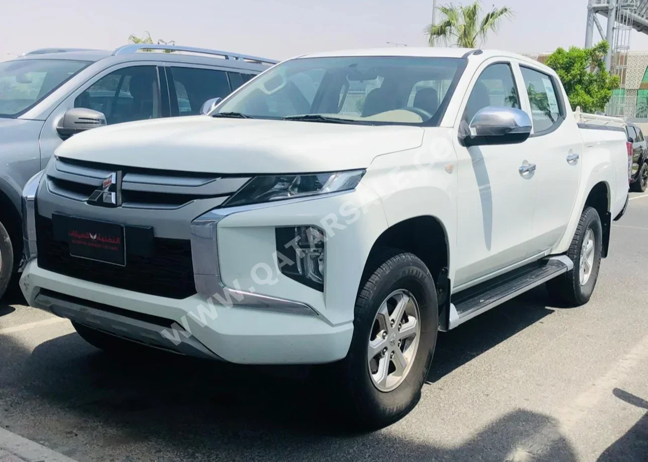 Mitsubishi  L 200  Diesel  2020  Manual  144,000 Km  4 Cylinder  Four Wheel Drive (4WD)  Pick Up  White