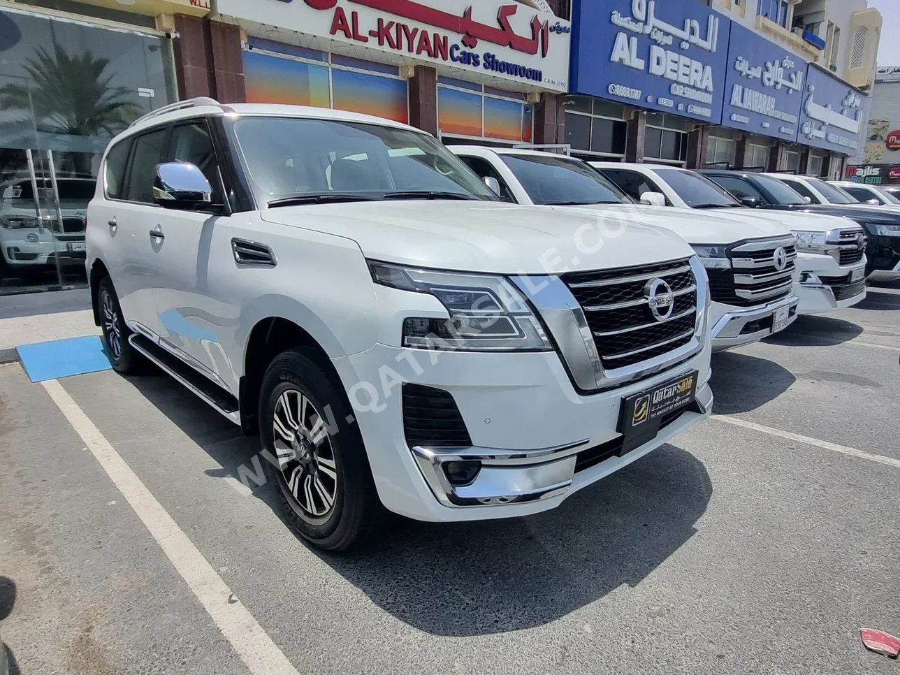 Nissan  Patrol  Platinum  2020  Automatic  118,000 Km  8 Cylinder  Four Wheel Drive (4WD)  SUV  White