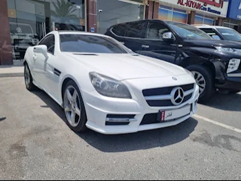 Mercedes-Benz  SLK  200  2015  Automatic  140,000 Km  4 Cylinder  Rear Wheel Drive (RWD)  Coupe / Sport  White