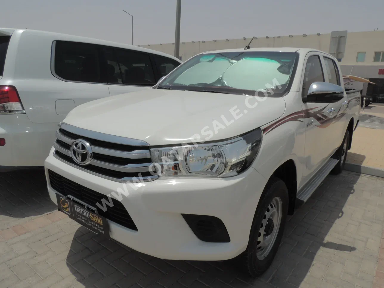 Toyota  Hilux  2022  Automatic  63,000 Km  4 Cylinder  Four Wheel Drive (4WD)  Pick Up  White