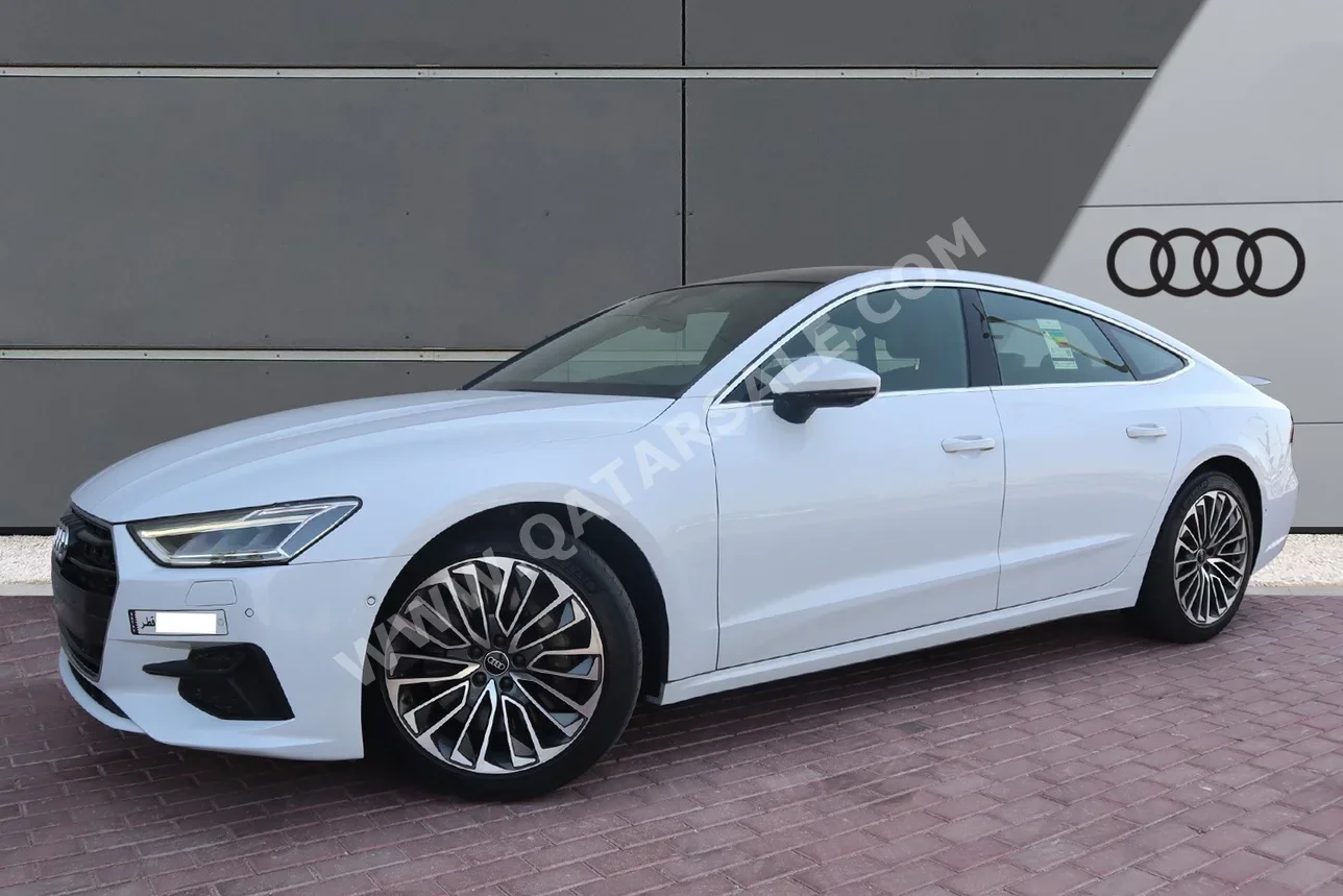 Audi  A7  3.0 T-Quattro  2022  Automatic  30,000 Km  6 Cylinder  All Wheel Drive (AWD)  Sedan  White  With Warranty