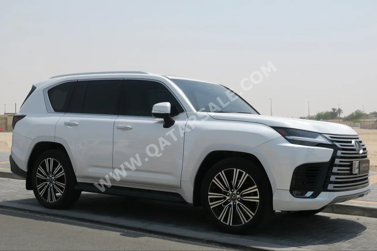 Lexus  LX  600 Luxury  2023  Automatic  33,000 Km  6 Cylinder  Four Wheel Drive (4WD)  SUV  White  With Warranty