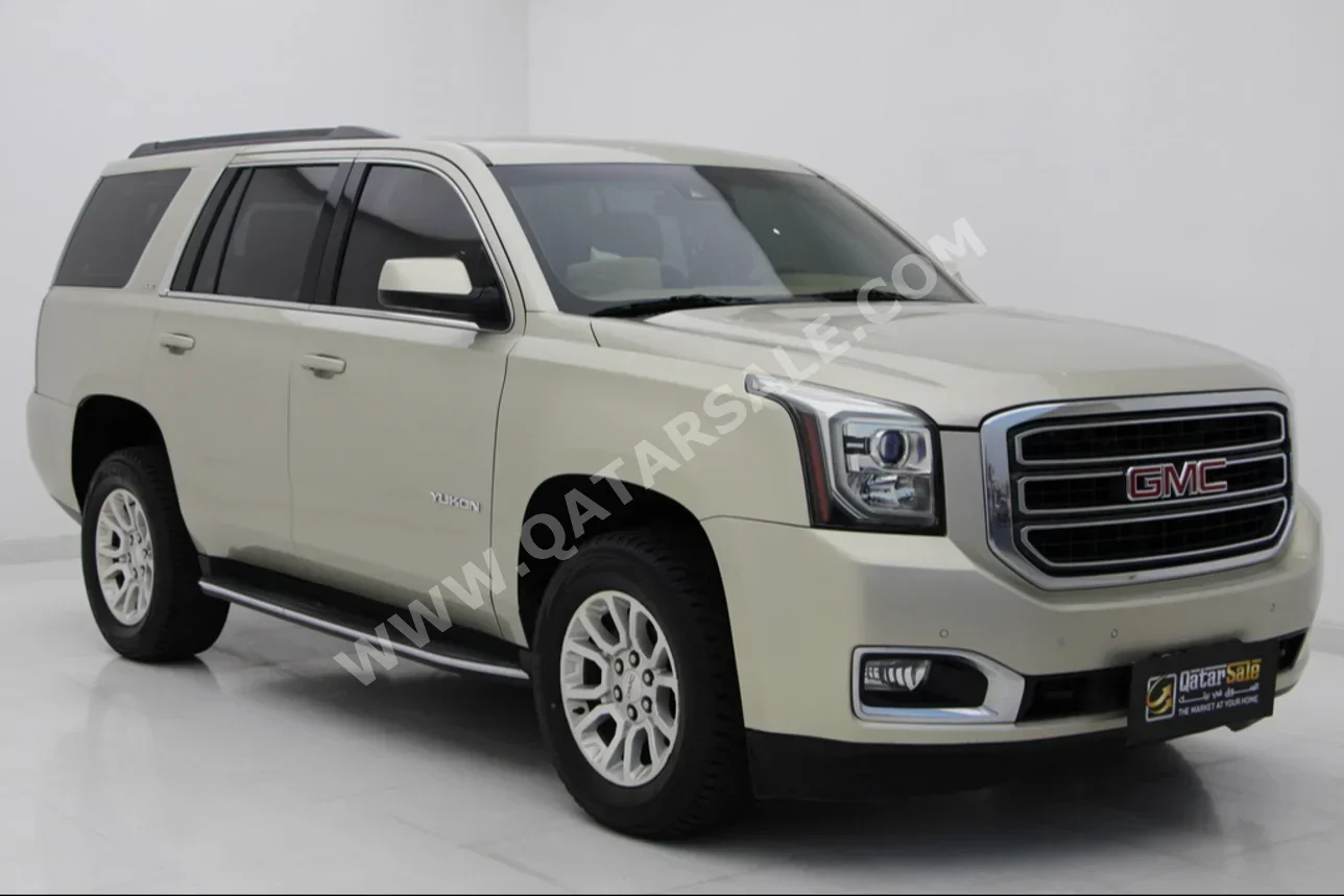 GMC  Yukon  2017  Automatic  115,000 Km  8 Cylinder  Four Wheel Drive (4WD)  SUV  Gold