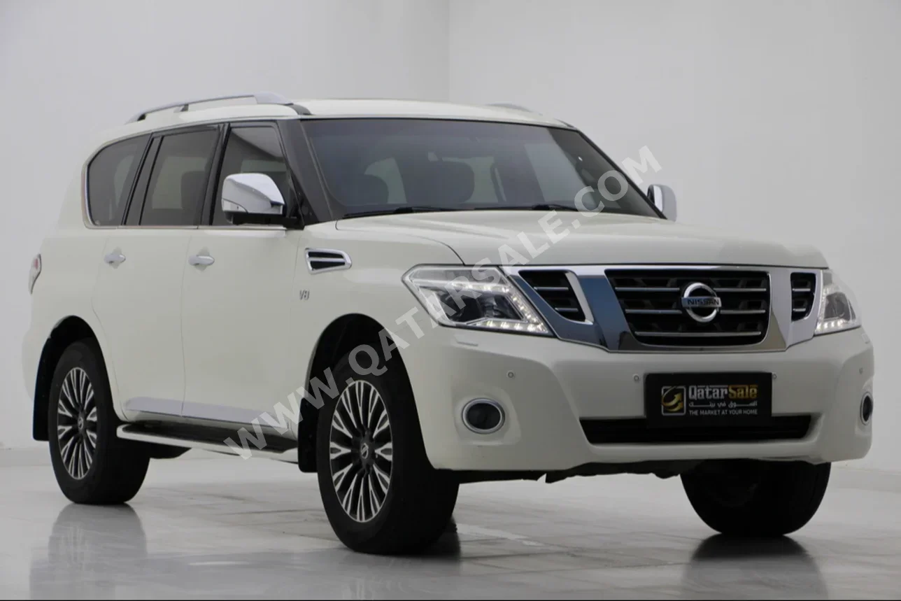 Nissan  Patrol  Platinum  2015  Automatic  215,000 Km  8 Cylinder  Four Wheel Drive (4WD)  SUV  Pearl