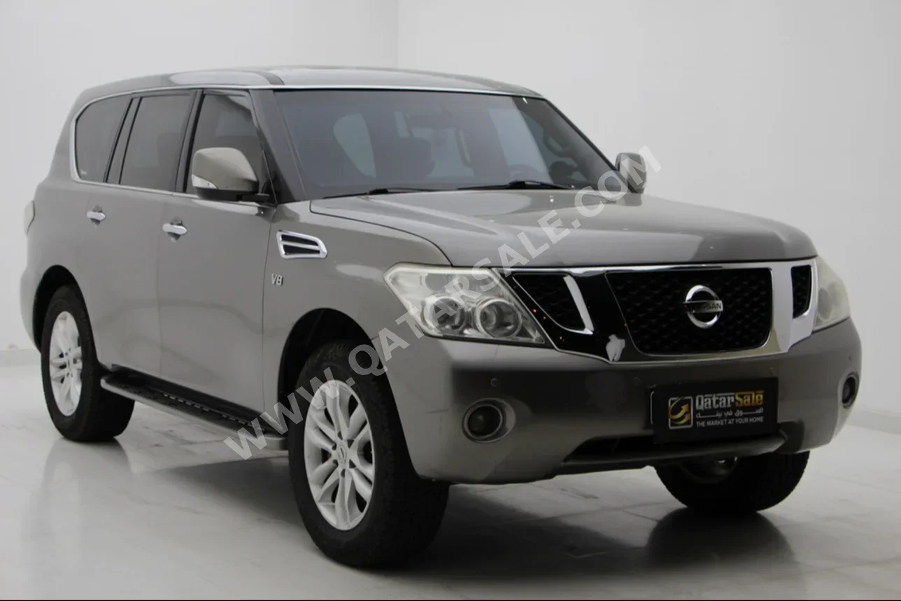 Nissan  Patrol  2013  Automatic  212,000 Km  8 Cylinder  Four Wheel Drive (4WD)  SUV  Gray  With Warranty