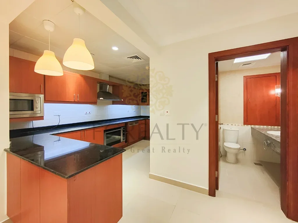 2 Bedrooms  Apartment  For Rent  in Doha -  The Pearl  Not Furnished