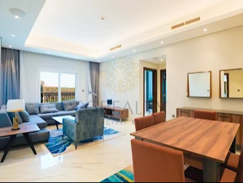 2 Bedrooms  Apartment  For Rent  in Doha -  The Pearl  Fully Furnished