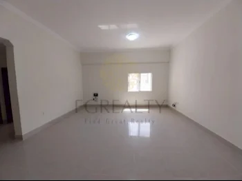 3 Bedrooms  Apartment  For Rent  in Doha -  Fereej Bin Mahmoud  Not Furnished