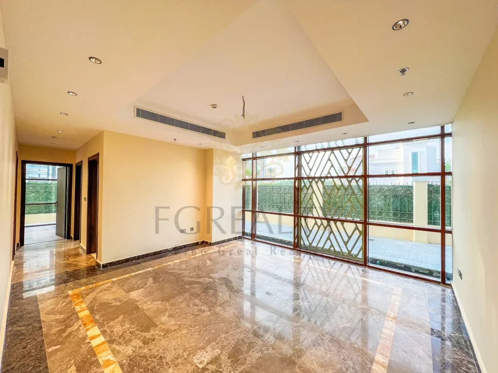 2 Bedrooms  Apartment  For Rent  in Doha -  The Pearl  Not Furnished